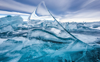 Ice sculpture frozen lake mountains - ice free wallpaper