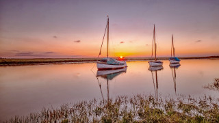 Boats lake sunset trees mountains - sunset free wallpaper