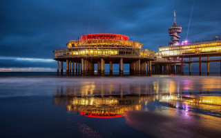 Pier tower clocknight lights water - a pier free wallpaper