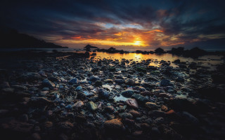 Sunset rocky beach cloudy sky - rock and water free wallpaper