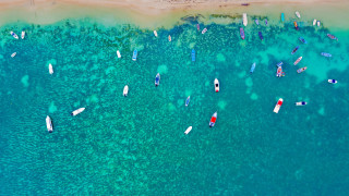 Boats ocean beach tiltshift aerial - a group of boats free wallpaper