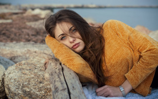 Woman rock beach blurry photorealistic - a body of water free wallpaper for desktop