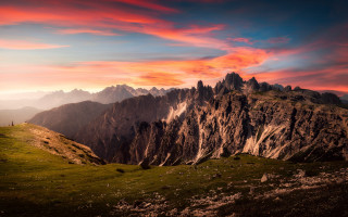 Mountain range sunset red sky - a sunset in the background free wallpaper