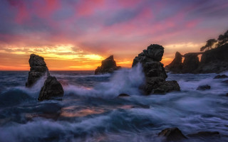 Sunset ocean rocks pink sky - mystical free wallpaper