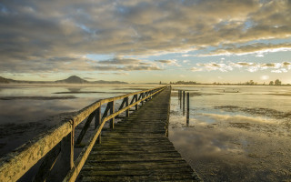 Wooden pier sunset mountain clouds - a wooden pier free wallpaper