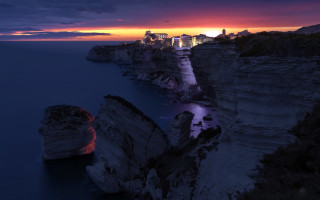 Sunset city cliff ocean red - photorealism free wallpaper
