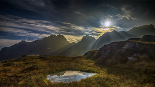 Mountain pond sunbeam clouds landscape - crepuscular ray free wallpaper