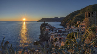 Sunset coastal town mountain lake - magic realism free wallpaper for desktop