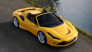 Yellow sports car cliffs water - a yellow sports car free wallpaper