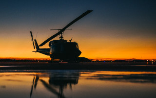 Helicopter tarmac sunset reflection water - its reflection free wallpaper