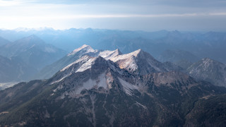 Mountain range snow capped city - murata range free wallpaper