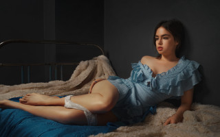 Woman blue dress bed room - a hyperrealistic painting free wallpaper