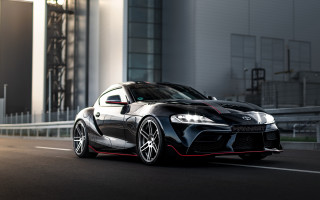 Black sports car street building 2 - a tall building free wallpaper