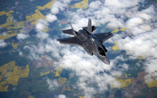 Fighter jet cloudy sky city 4 - 100mm free wallpaper