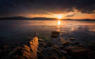 Sunset water rocks mountains city - sunset free wallpaper