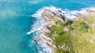 Rocky coastline aerial island water - aerial free wallpaper