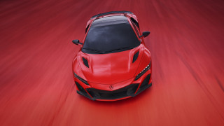 Red sports car black hood 2 - a red surface free wallpaper