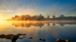 Sunset mountain lake trees mist - a sun setting free wallpaper