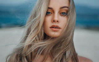 Woman longhair blueeyes beachportrait neoplasticism - a beach in the background free wallpaper