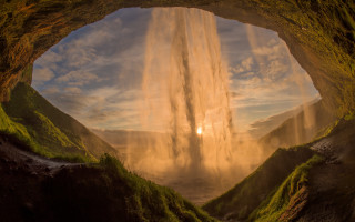 Waterfall cave sunset forest mountains - a large waterfall free wallpaper