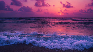 Sunset ocean waves shore city - a sunset over the ocean free wallpaper