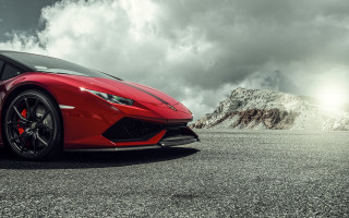 Red sports car mountains clouds 2 - a red sports car free wallpaper