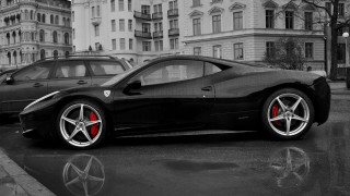 Black sports car wet street - wet free wallpaper