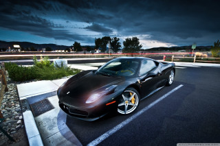 Black sports car night parked - a dark sky in the background free wallpaper