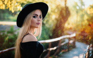Blonde woman black hat fashion - a wooden fence free wallpaper