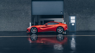 Red sports car garage night 2 - side profile free wallpaper
