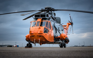 Helicopter tarmac cloudy sky person - the tarmac free wallpaper