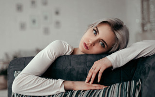Woman grey hair couch portrait - grey hair free wallpaper
