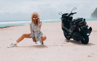Woman dress sunglasses scooter beach - a beach near the ocean free wallpaper