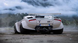 White sports car wet road 3 - a wet road free wallpaper