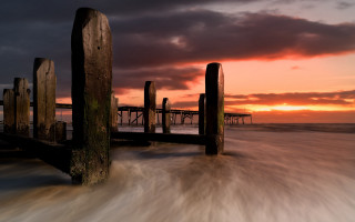 Pier sunset water mountain city - a pier free wallpaper