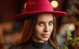 Woman redhat blackshirt plant portrait - a red hat free wallpaper