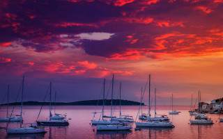 Boats water clouds sunset cityscape - a group of boats free wallpaper