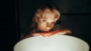 Woman holding white plate serious - anka zhuravleva free wallpaper