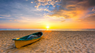 Boat sunset beach clouds horizon - sunset free wallpaper