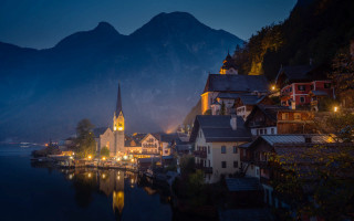 Town church mountains water night - the background and a body of water free wallpaper