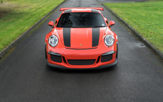 Red sports car road lush - a lush green field free wallpaper