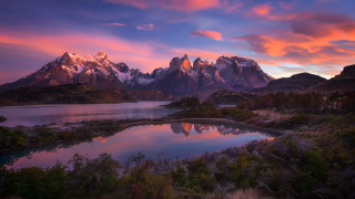 Mountain lake sunset pink sky 10 - a lake in the foreground and a sunset in the background free wallpaper