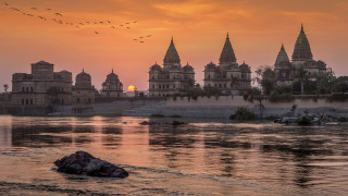 Sunset city water spires matte - a body of water free wallpaper for desktop