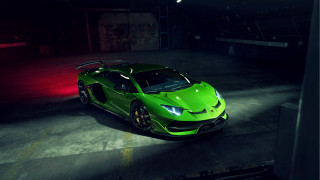 Green sports car garage night - a green sports car free wallpaper