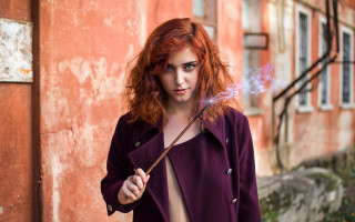 Redhaired woman wand serious magic - red hair holding free wallpaper