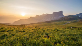 Grassy field mountain sunset trail - a grassy field free wallpaper