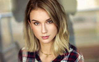 Blonde woman plaid shirt camera - free portrait wallpaper