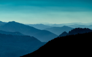Mountain range trees blue sky 5 - a blue sky in the background free wallpaper for desktop