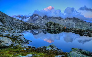 Mountain lake rocks grass clouds 2 - a mountain lake free wallpaper