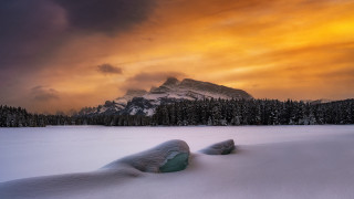 Snowy mountain landscape dusk reflection - a cloudy sky above free wallpaper